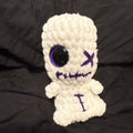 White and purple Voodoo Doll