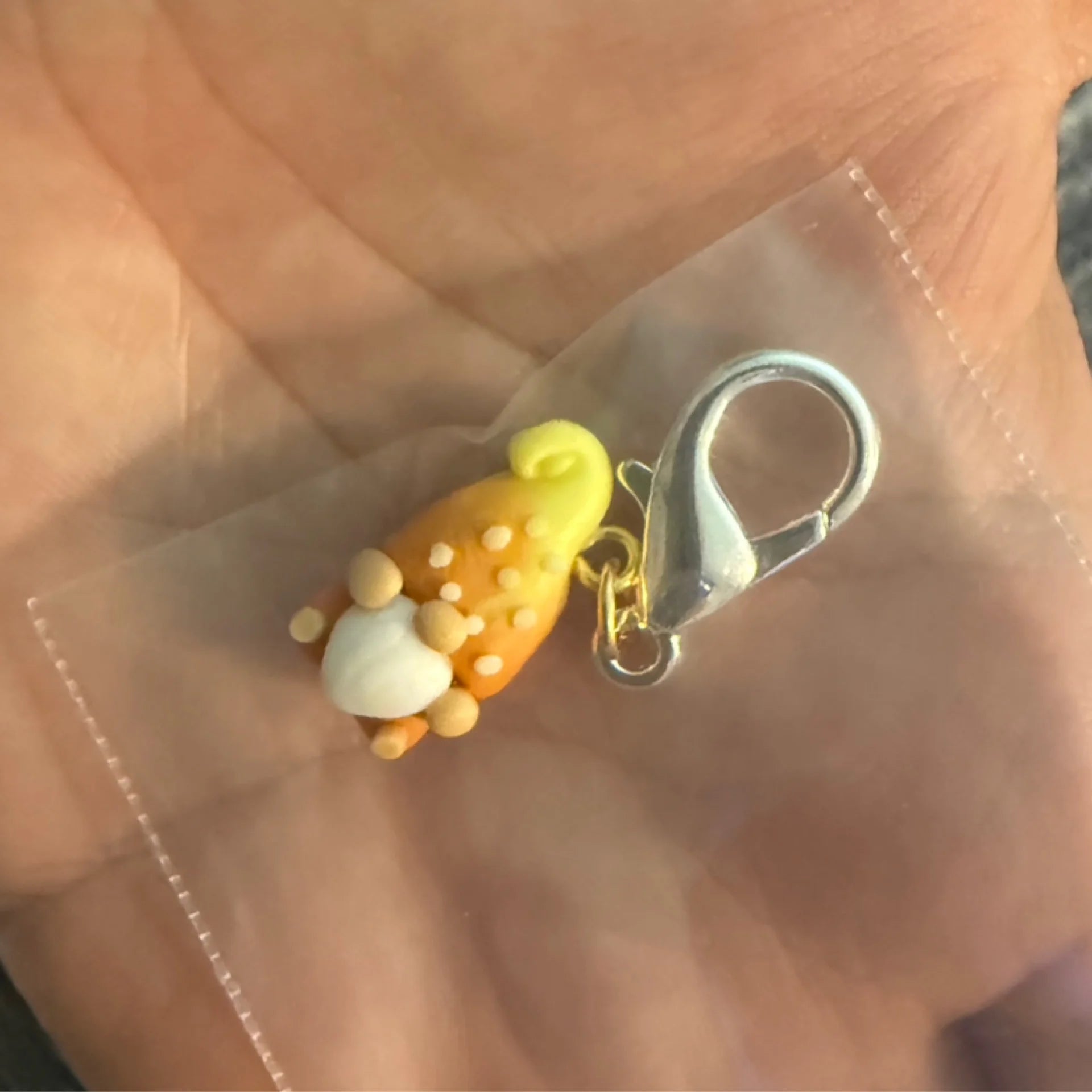 Yellow gnome stitch marker